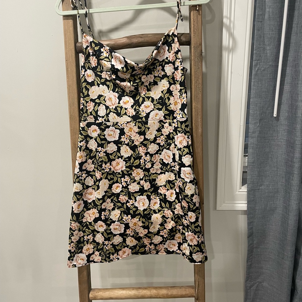Fun short satin floral dress with tie straps. Scoop next